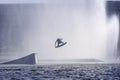 Wakeboarder jumping in the lake