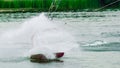 Wakeboarder making wave Royalty Free Stock Photo