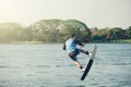 Wakeboarder trains in the lake Royalty Free Stock Photo