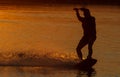 Wakeboarder trains at sunset Royalty Free Stock Photo