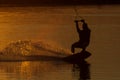 wakeboarder trains at sunset Royalty Free Stock Photo
