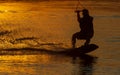 wakeboarder trains at sunset Royalty Free Stock Photo