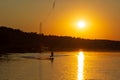 wakeboarder trains at sunset Royalty Free Stock Photo