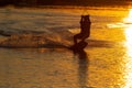 wakeboarder trains at sunset Royalty Free Stock Photo