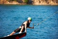 Wakeboarding, fitness and water sports with man in lake for action, summer break and travel vacation. Wave, adrenaline Royalty Free Stock Photo