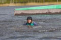 Wakeboarding. Girl wakeboarder falls into the water after an unsuccessful jump Royalty Free Stock Photo