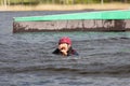 Wakeboarding. Girl wakeboarder falls into the water after an unsuccessful jump Royalty Free Stock Photo