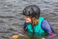 Wakeboarding. Girl wakeboarder fell into the water after an unsuccessful jump Royalty Free Stock Photo