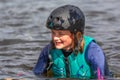 Wakeboarding. Girl wakeboarder fell into the water after an unsuccessful jump Royalty Free Stock Photo