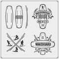 Wakeboarding silhouettes, labels and design elements. Set of emblems for wakeboard club and print design for t-shirt. Royalty Free Stock Photo