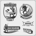 Wakeboarding silhouettes, labels and design elements. Set of emblems for wakeboard club and print design for t-shirt. Royalty Free Stock Photo