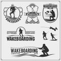 Wakeboarding silhouettes, labels and design elements. Set of emblems for wakeboard club and print design for t-shirt. Royalty Free Stock Photo