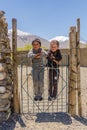 WAKHAN VALLEY, TAJIKISTAN - MAY 24, 2018: Local village boys in Wakhan valley, Tajikist Royalty Free Stock Photo