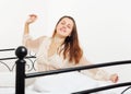 Waking woman in nightrobe Royalty Free Stock Photo