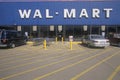 Wal * Mart Supercenter Store front entrance and parking lot in Southeast USA