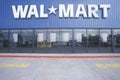 Wal * Mart Supercenter Store front entrance and parking lot in Southeast USA