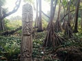 Walarano village, Malekula Island / Vanuatu - 9 JUL 2016 : carved wood totem statue as a warning sign just outside of the village