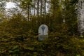 Stone board at Station of the Cross plaque in mountains