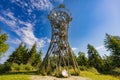 Beautiful high metal and spiral mountain viewing tower on top of Borowa mountain at sunny