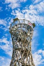 Beautiful high metal and spiral mountain viewing tower on top of Borowa mountain at sunny