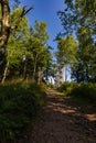 Beautiful high metal and spiral mountain viewing tower on top of Borowa mountain seen from