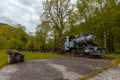 Waldbahn Reichraming, old museum narrow gauge railway close to Reichraming, Austria. View of the steam engine and a row of wagons Royalty Free Stock Photo