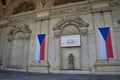 Waldstein palace in Mala strana with Czech flags, Prague - House of Senate