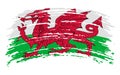 Wales flag in grunge brush stroke, vector Royalty Free Stock Photo