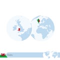 Wales on world globe with flag and regional map of Wales Royalty Free Stock Photo