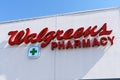 Walgreens Pharmacy signature brandmark and the green cross on pharmacy chain store. Royalty Free Stock Photo