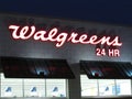 Walgreens sign on the wall in Edison on Rt 1 at late evening, NJ USA. Royalty Free Stock Photo