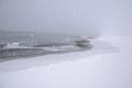 Walk along the beach during a snowstorm in Iceland Royalty Free Stock Photo