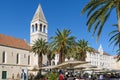 A walk along the coastal promenade and a view of the important monument of Trogir - St. Dominic Monastery. Croatia Royalty Free Stock Photo