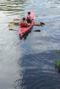 Walk along the river in a kayak