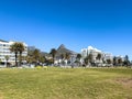 A walk along the Sea Point Promenade with Lions Head in the distance