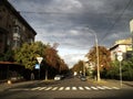 Walk along the street of the city of Kiev view of the houses and the stormy sky