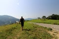 Consulting an explanatory panel during a walk in the mountains