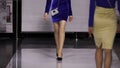 Walk defile girl colorful dress catwalk model show closeup vogue. Woman podium. Royalty Free Stock Photo