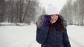 Walk in the fresh air. Young woman talking on the phone in the park Royalty Free Stock Photo