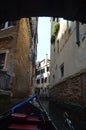 Gondola Passing Under The Bridges Of The Canals In Venice. Travel, holidays, architecture. March 29, 2015. Venice, Veneto
