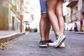 Walk a guy and a girl, focus on their new sandals