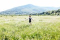 Walk Journey Woman in Field in Flowers in Nature