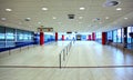 Walk with ladder grab in empty hall inside airport Royalty Free Stock Photo