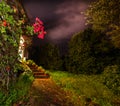 Walk path in a private garden at night Royalty Free Stock Photo
