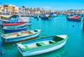 Walk the seaside promenade of Marsaxlokk Royalty Free Stock Photo