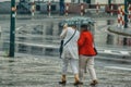 Walk under an umbrella during a heavy downpour Royalty Free Stock Photo