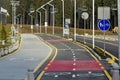 Walk way and bicycle lane signs on the asphalt road surface Royalty Free Stock Photo