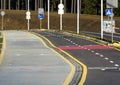 Walk way and bicycle lane signs on the asphalt road surface Royalty Free Stock Photo