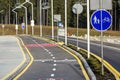 Walk way and bicycle lane signs on the asphalt road surface Royalty Free Stock Photo