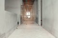 Walk way interior and scaffolding in construction building site with sun light tone Royalty Free Stock Photo